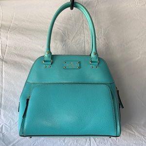Turquoise Kate Spade handle bag.